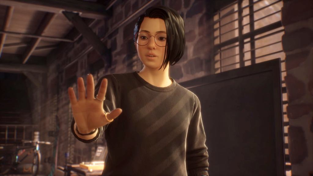 Alex looking at hand while discovering powers in Life is Strange: True Colors